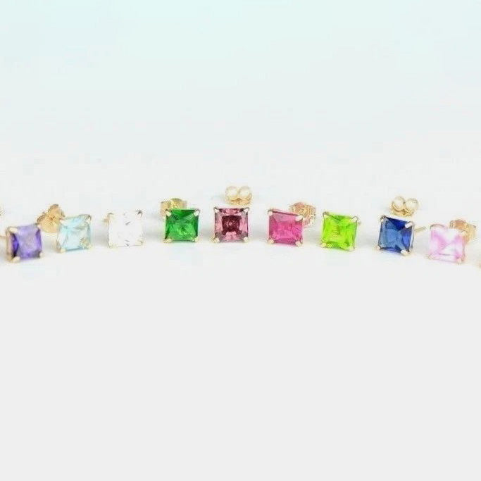 Set of colorful square gemstone earrings on a white background