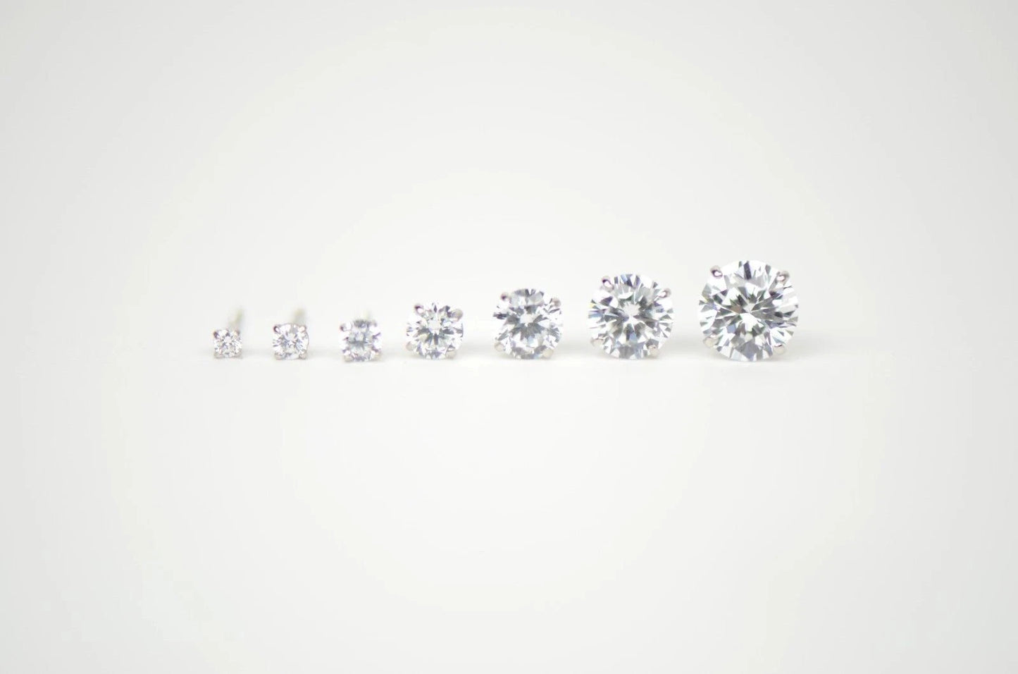 CZ Stud Earring Round cut in 14k white gold Screw back
