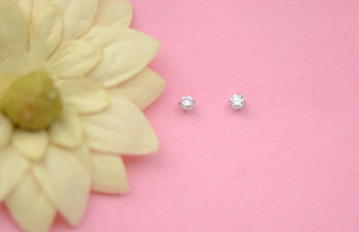 CZ Stud Earring Round cut in 14k white gold Screw back