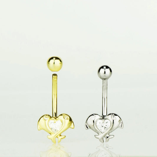 Gold and silver heart-shaped belly button rings on a white background
