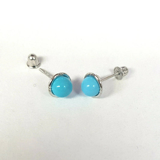 Turquoise stud earrings on a white background